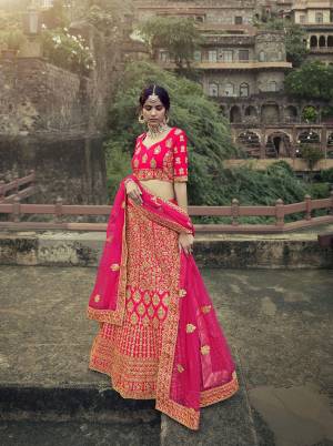 Look Attractive In This Designer Heavy Lehenga Choli In Ptrtty Color Paired?With Lovely Blouse And Dupatta. This Blouse And Lehenga Are Fabricated On Satin Paired With Soft Net Fabricated Dupatta. It Has Heavy Designer Glitter Dori,Jari With Thread Embroidery And Stone Work.Buy Now.