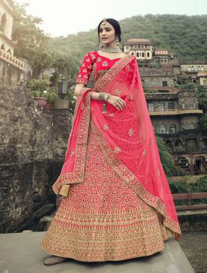 Look Attractive In This Designer Heavy Lehenga Choli In Ptrtty Color Paired?With Lovely Blouse And Dupatta. This Blouse And Lehenga Are Fabricated On Satin Paired With Soft Net Fabricated Dupatta. It Has Heavy Designer Glitter Dori,Jari With Thread Embroidery And Stone Work.Buy Now.