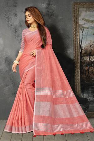 Enhance Your Personality In This Lovely Colored Designer Saree. This Saree And Blouse Are Linen Based Fabric With Heavy Wevon Pallu Border Designer. Buy This Pretty Saree Now.