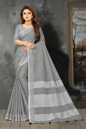 Enhance Your Personality In This Lovely Colored Designer Saree. This Saree And Blouse Are Linen Based Fabric With Heavy Wevon Pallu Border Designer. Buy This Pretty Saree Now.