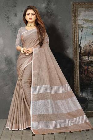 Enhance Your Personality In This Lovely Colored Designer Saree. This Saree And Blouse Are Linen Based Fabric With Heavy Wevon Pallu Border Designer. Buy This Pretty Saree Now.