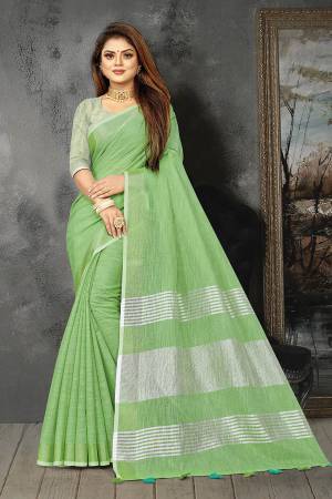 Enhance Your Personality In This Lovely Colored Designer Saree. This Saree And Blouse Are Linen Based Fabric With Heavy Wevon Pallu Border Designer. Buy This Pretty Saree Now.