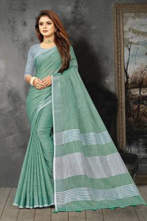 Enhance Your Personality In This Lovely Colored Designer Saree. This Saree And Blouse Are Linen Based Fabric With Heavy Wevon Pallu Border Designer. Buy This Pretty Saree Now.