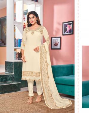 Look Pretty Wearing This Designer Suit In Off White Color Paired With Off White Colored Bottom And Dupatta. Its Top Is Fabricated On Georgette Paired With Santoon Bottom And Faux Georgette Dupatta. Its Top Is Beautified With Designer Embroidery,Stone Work. Buy Now