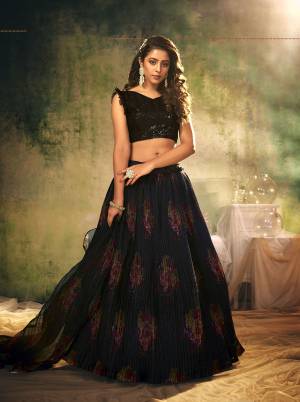 Look Attractive In This Designer Heavy Lehenga Choli In Pretty Color Paired With Lovely Blouse And Dupatta.Its Blouse is Banglori Silk And Lehenga And Dupatta Is Organza Based Fabric.Beautified With Sequance Embroidery Work,Digital Printed,Crushed Plated.