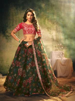 Look Attractive In This Designer Heavy Lehenga Choli In Pretty Color Paired With Lovely Blouse And Dupatta.Its Blouse is Banglori Silk And Lehenga And Dupatta Is Organza Based Fabric.Beautified With Sequance Embroidery Work,Digital Printed,Crushed Plated.