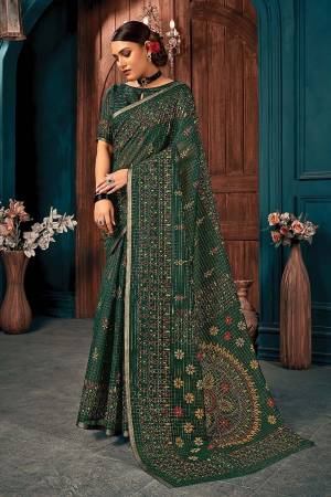 You Will Definitely Earn Lots Of Compliments Wearing This Pretty Elegant Looking Saree In Pretty Color Paired With Matching Colored Blouse.This Saree and Blouse Are Fabricated On Cotton. It Is Beautified With Printed Designer Weaving Work