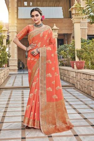 You Will Definitely Earn Lots Of Compliments Wearing This Pretty Elegant Looking Saree In Pretty Color Paired With Matching Colored Blouse.This Saree and Blouse Are Fabricated On Cotton. It Is Beautified With Printed Designer Weaving Work