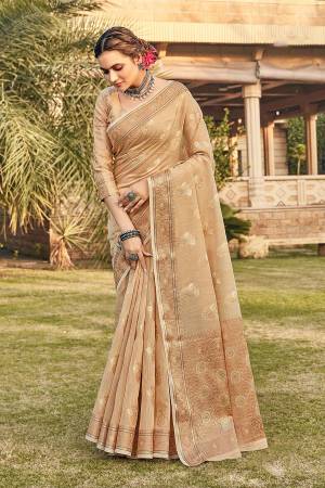 You Will Definitely Earn Lots Of Compliments Wearing This Pretty Elegant Looking Saree In Pretty Color Paired With Matching Colored Blouse.This Saree and Blouse Are Fabricated On Cotton. It Is Beautified With Printed Designer Weaving Work