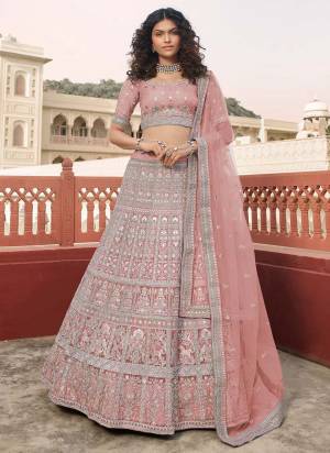 Look Attractive In This Designer Heavy Lehenga Choli In Pretty Color Paired With Lovely Blouse And Dupatta.Its Beautified With Heavy Jari,Thread,Dori Embroidery,Zarkan Work.Buy Now