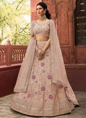 Look Attractive In This Designer Heavy Lehenga Choli In Pretty Color Paired With Lovely Blouse And Dupatta.Its Beautified With Heavy Jari,Thread,Dori Embroidery,Zarkan Work.Buy Now