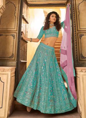 Grab These Heavy Designer Lehenga in Beautiful Coloed Pair With Designer Pretty Blouse And Dupatta These Lehenga is Beautified With Orgnaza Based Fabric Come With Organza Blouses And Soft Net Dupatta Beautified With Heavy Designer Work