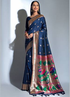 Enhance Your Personality In This Lovely Colored Saree Come With Matching Blouse?This Saree And Blouse Are Banarasi Soft Silk Based Fabric With Wevon Paithani Designer.Buy This Pretty Saree Now