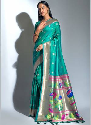 Enhance Your Personality In This Lovely Colored Saree Come With Matching Blouse?This Saree And Blouse Are Banarasi Soft Silk Based Fabric With Wevon Paithani Designer.Buy This Pretty Saree Now