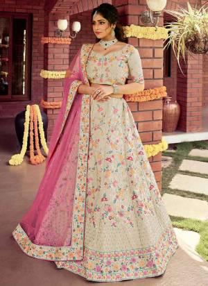 Catch All The Limelight At The Next Wedding You Attend Wearing This Heavy Designer Lehenga Choli In Pretty Colored Blouse Paired With Ptrtty Colored Lehenga And Dupatta. Its Pretty Embroidered Blouse And Dupatta Are Fabricated on Soft Net Paired With Embroidered Organza Fabricated Lehenga And Blouse.