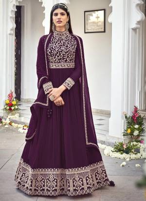 You Will Definitely Earn Lots Of Compliments In This Lovely Suit In Beautifull Colored Top Paired With Pretty Bottom And Dupatta. Its Top Is Fabricated On Faux Georgette Paired With Santoon Fabricated Bottom And Faux Georgette Dupatta Beautified With Heavy Designer Embroidery,Diamond Work.