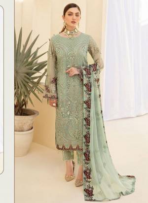 Here Is A Very Beautiful Suit In Pretty Colored Top Bottom And Dupatta. Top is?Fabricated On Faux Georgette Pair With Santoon Bottom And Nazmin Dupatta Beautified With Designer Heavy Embroidery,Diamond Work