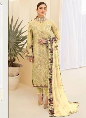 Here Is A Very Beautiful Suit In Pretty Colored Top Bottom And Dupatta. Top is?Fabricated On Faux Georgette Pair With Santoon Bottom And Nazmin Dupatta Beautified With Designer Heavy Embroidery,Diamond Work