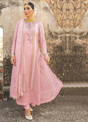 Royal And Elegant Looking Designer Suit Is Here In All Over Pretty Colored Top?and Bottom And Dupatta. This Semi-Stitched Suit Is Georgette Based Beautified With Heavy Designer Embroidery,Diamond Work