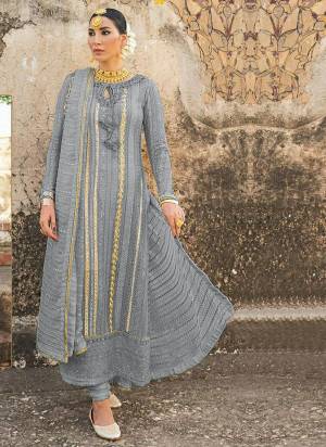 Royal And Elegant Looking Designer Suit Is Here In All Over Pretty Colored Top?and Bottom And Dupatta. This Semi-Stitched Suit Is Georgette Based Beautified With Heavy Designer Embroidery,Diamond Work