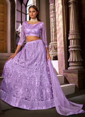 for a Designer Look,Grab These Lehenga in All Over Pretty Colored.its lehenga is Fabricated On Net Based Pair With Net Blouse And Net Dupatta Beautified With Designer Heavy Embroidery Work