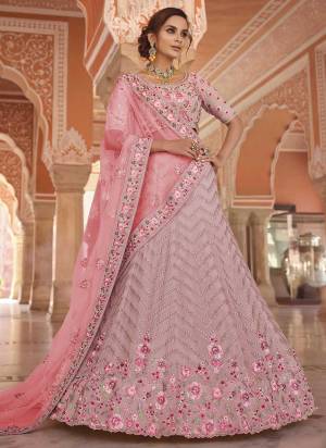 For A Beautifull Look,Grab These Heavy Designer Lehenga Choli In All Over Pretty Look.Its Lehenga And Choli Are Fabricated On Georgette Pair With Net Blouse.Beautified Heavy Designer Work.