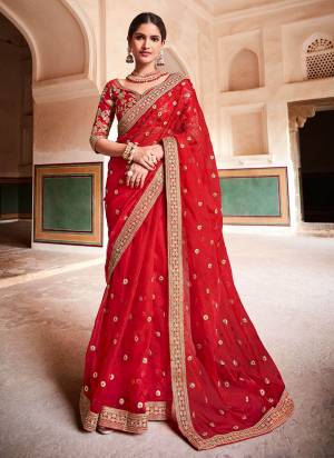 Grab These Beautiful Saree In Pretty Colored Pair With Matching Blouse.Its Saree is Fabricated On Organza Pair With Art Silk Blouse.Beautified With Heavy Work.