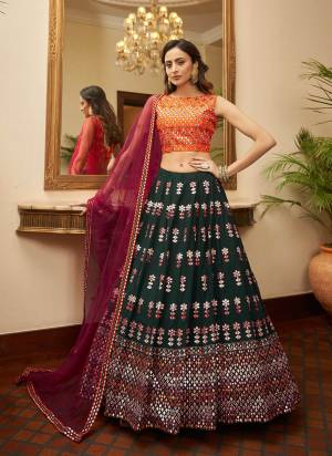 New And Unique Lehenga Is Here With Lovely Color Paired With Blouse And Dupatta.This Lehenga is Fabricated On Georgette Based Pair With Net Dupatta And Art Silk Blouse.Come With Designer Work.