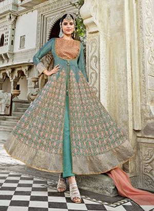 Enhance Your Personality Wearing This Designer Suit In Lovely Colored Top Paired With Bottom And Dupatta. Its Fabricated On Silk Based. It Is Beautified With Designer Heavy Embroidery Work Making The Suit Attractive. Buy Now