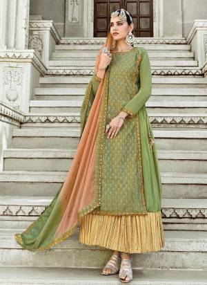 Enhance Your Personality Wearing This Designer Suit In Lovely Colored Top Paired With Bottom And Dupatta. Its Fabricated On Georgette Based. It Is Beautified With Designer Heavy Embroidery Work Making The Suit Attractive. Buy Now