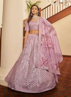 You Will Definitely Earn Lots Of Compliments Wearing This Designer Lehenga in Lovely Colored Pair With Blouse And Dupatta.Its Lehenga Is Fabricated On Art Silk Pair With Art Silk Blouse And Organza Dupatta.Beautified With Designer Embroidery.