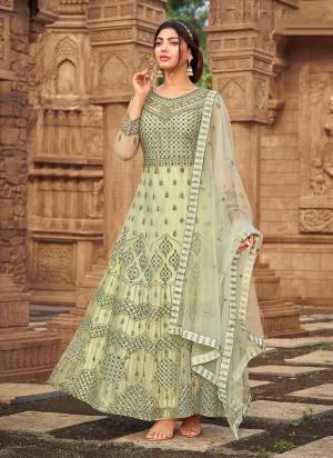 Grab These Designer Suit In Pista Green Color Top Pair With Matching Bottom And Dupatta.These Top is Fabricated On Butterfly Net Pair With Japan Satin Bottom And Net Dupatta.Its Beautified With Designer Work.