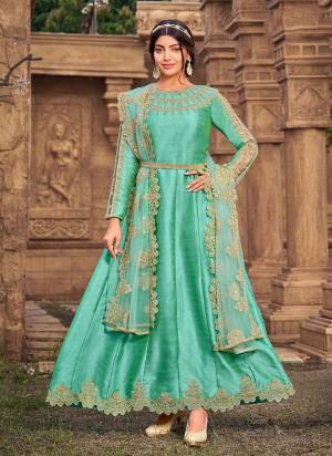 Grab These Designer Suit In Sea Green Color Top Pair With Matching Bottom And Dupatta.These Top is Fabricated On Super Silk Pair With Soft Net Bottom And Soft Net Dupatta.Its Beautified With Designer Work.