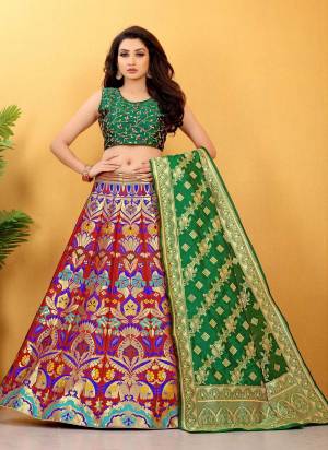 Grab These Beautiful Lehenga In Fine Colored.Its Lehenga is Fabricated On Banarasi Silk Pair With Banarasi Silk Blouse And Dupatta.Its Beautified With  Wevon Designer,Embroidery Work. 