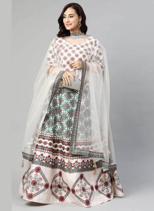 For A Pretty Look , Grab These Lehenga Come With Fine Colored Pair With Blouse And Dupatta.These Lehenga And Blouse Are Fabricated On Art Silk Based Pair With Net Blouse Its Beautified With Designer Digital Printed.