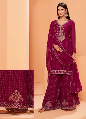 For A Designer Look ,Grab These Sharara Suit In All Over Pretty Colored.These Top Is Fabricated On Georgette Pair With Georgette Bottom And Dupatta.Its Beautified With Heavy Designer Work.Buy Now These Sharara Suit Collection.