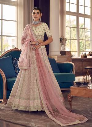 For A Designer Look,Grab These Heavy Deigner Lehenga in All Over Beautiful Colored.These Lehenga is Fabricated On Art Silk Pair With Art Silk Blouse And Soft Net Dupatta.Its Beaitified With Heavy Designer Work.