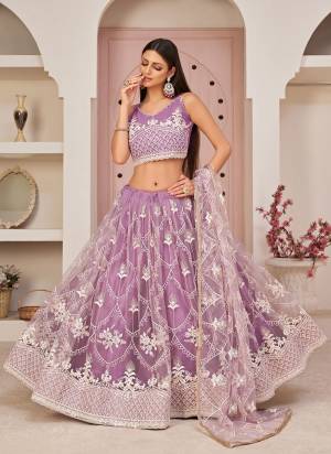 For A Different Look,Grab These Designer Lehenga in All Over Pretty Colored Pair With Blouse And Dupatta.These Lehenga Choli is All Over Net Base Fabric With Designer Work.Buy Now These Lehenga For Up Coming Wedding Season