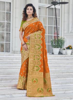 For A Different Look ,Grab These Saree in Beautiful Colored Pair With Contrasting Blouse These Saree And Blouse Are Fabricated on Banarasi Silk.Its Beautified With Heavy Wevon Jari Designer Work.