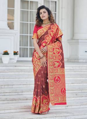 For A Different Look ,Grab These Saree in Beautiful Colored Pair With Contrasting Blouse These Saree And Blouse Are Fabricated on Banarasi Silk.Its Beautified With Heavy Wevon Jari Designer Work.