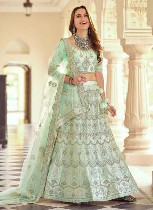 For A Designer Look , Grab These Designer Lehenga in All Over Fine Colored.These Lehenga And Blouse Are Fabricated on Crepe Pair With Soft Net Dupatta.Its Beautified With Designer Work.