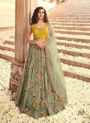 For A Designer Look,Grab These Lehenga in Beautiful Colored Pair With Designer Dupatta And Blouse.These Lehenga is Fabricated On Viscose Georgette Pair With Silk Blouse And Net Dupatta.Its Beautified With Heavy Designer Work.