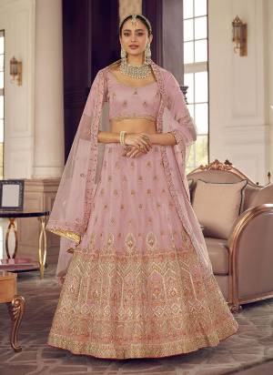 Look Pretty In This Lovely Shade With This Designer Heavy Lehenga Choli In?All Over Fine Colored.These Lehenga And Blouse Are Fabricated On Organza Based Pair With Soft Net Dupatta.Its Beautified With Heavy Designer Work.