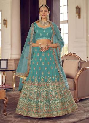 Look Pretty In This Lovely Shade With This Designer Heavy Lehenga Choli In?All Over Fine Colored.These Lehenga And Blouse Are Fabricated On Organza Based Pair With Soft Net Dupatta.Its Beautified With Heavy Designer Work.