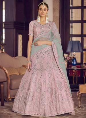 Look Pretty In This Lovely Shade With This Designer Heavy Lehenga Choli In?All Over Fine Colored.These Lehenga And Blouse Are Fabricated On Crepe Based Pair With Soft Net Dupatta.Its Beautified With Heavy Designer Work.