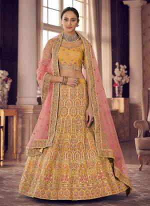 Look Pretty In This Lovely Shade With This Designer Heavy Lehenga Choli In?All Over Fine Colored.These Lehenga And Blouse Are Fabricated On Organza Based Pair With Soft Net Dupatta.Its Beautified With Heavy Designer Work.