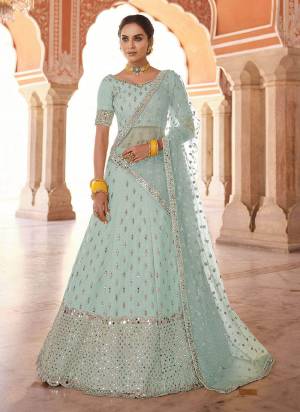 Flaunt Your Rich And Elegant Look Wearing This Designer?Lehenga Choli in All Over Beautiful Colored.These Lehenga And Blouse Are Fabricated On Art Silk Pair With Soft Net Blouse.Its Beautified With Heavy Designer Work.