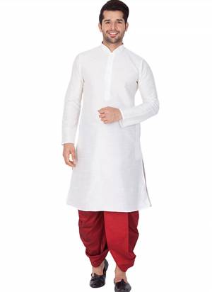 Take your ethnic style quotient to the next level by wearing this fashionable kurta set.Its Come With Banglori Silk Fabricated Kurta And Bottom.Its Beautified With Dyed Solid Work.