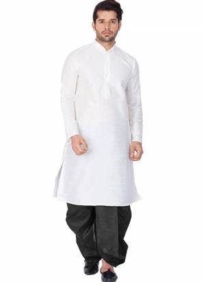 Take your ethnic style quotient to the next level by wearing this fashionable kurta set.Its Come With Banglori Silk Fabricated Kurta And Bottom.Its Beautified With Dyed Solid Work.