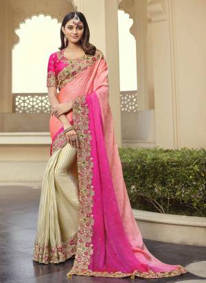 Grab These Designer Saree in Fine Colored Pair With Desiggner Blouse.These Saree And Blouse Are Fabricated On Art Silk.Its Beautified With Heavy Designer Embroidery Work.